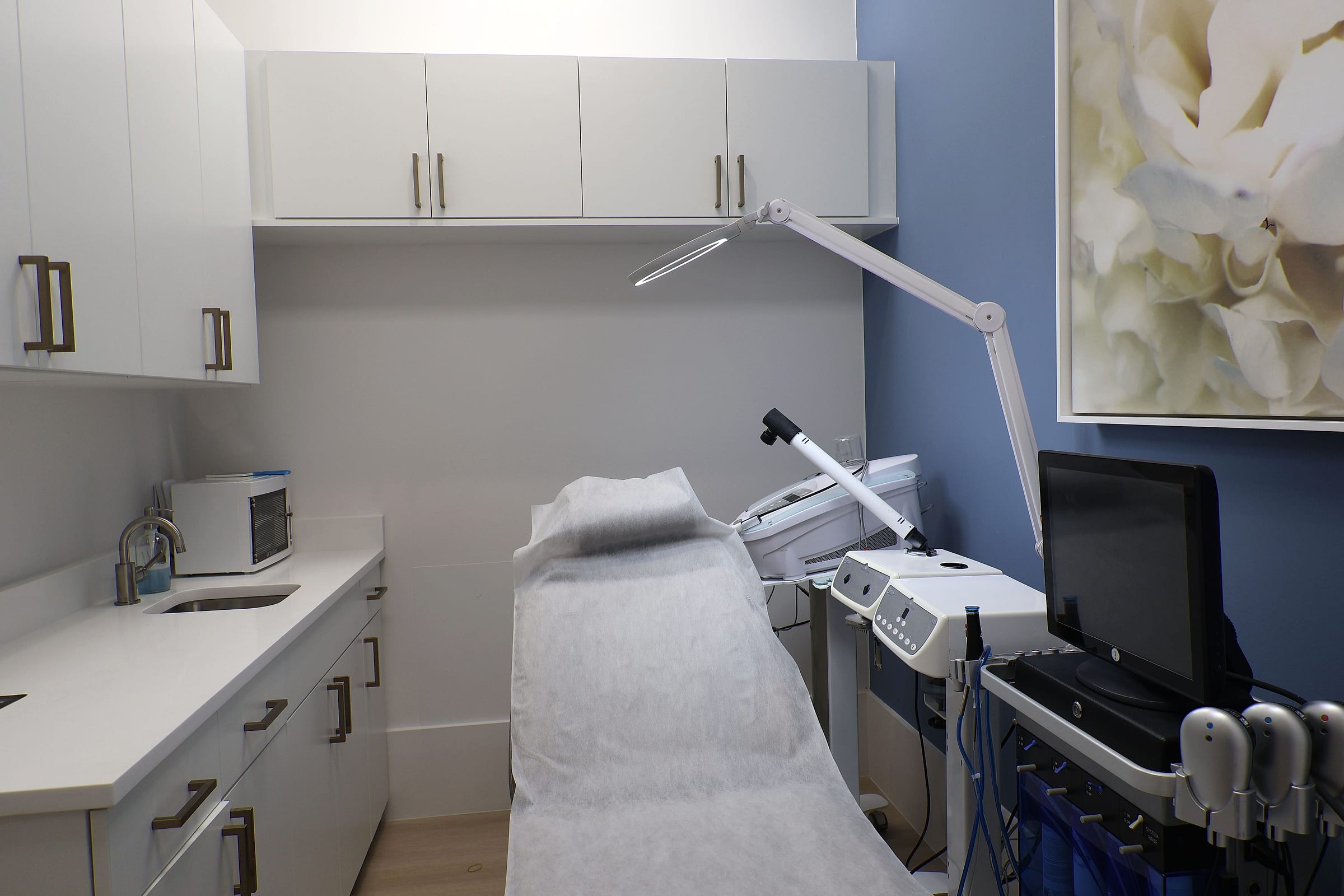 Skin Health & Facials, The facial treatment room at Naiva, with the treatment bed and skin equipment