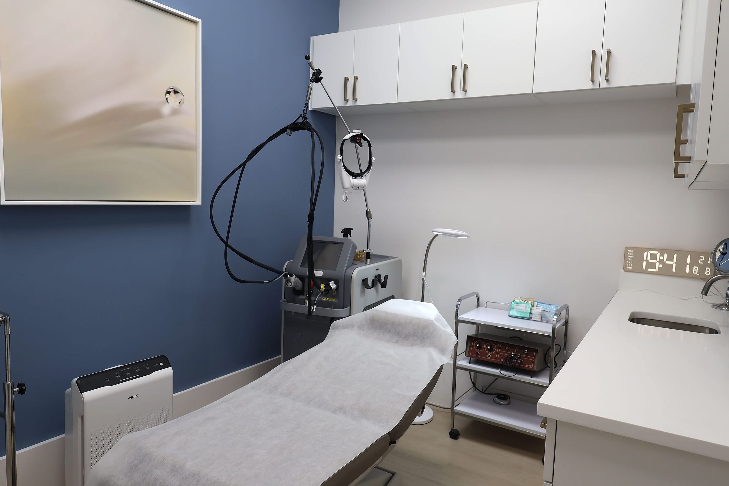 Laser Hair Removal, A laser treatment room at Naiva with the device beside the treatment bed