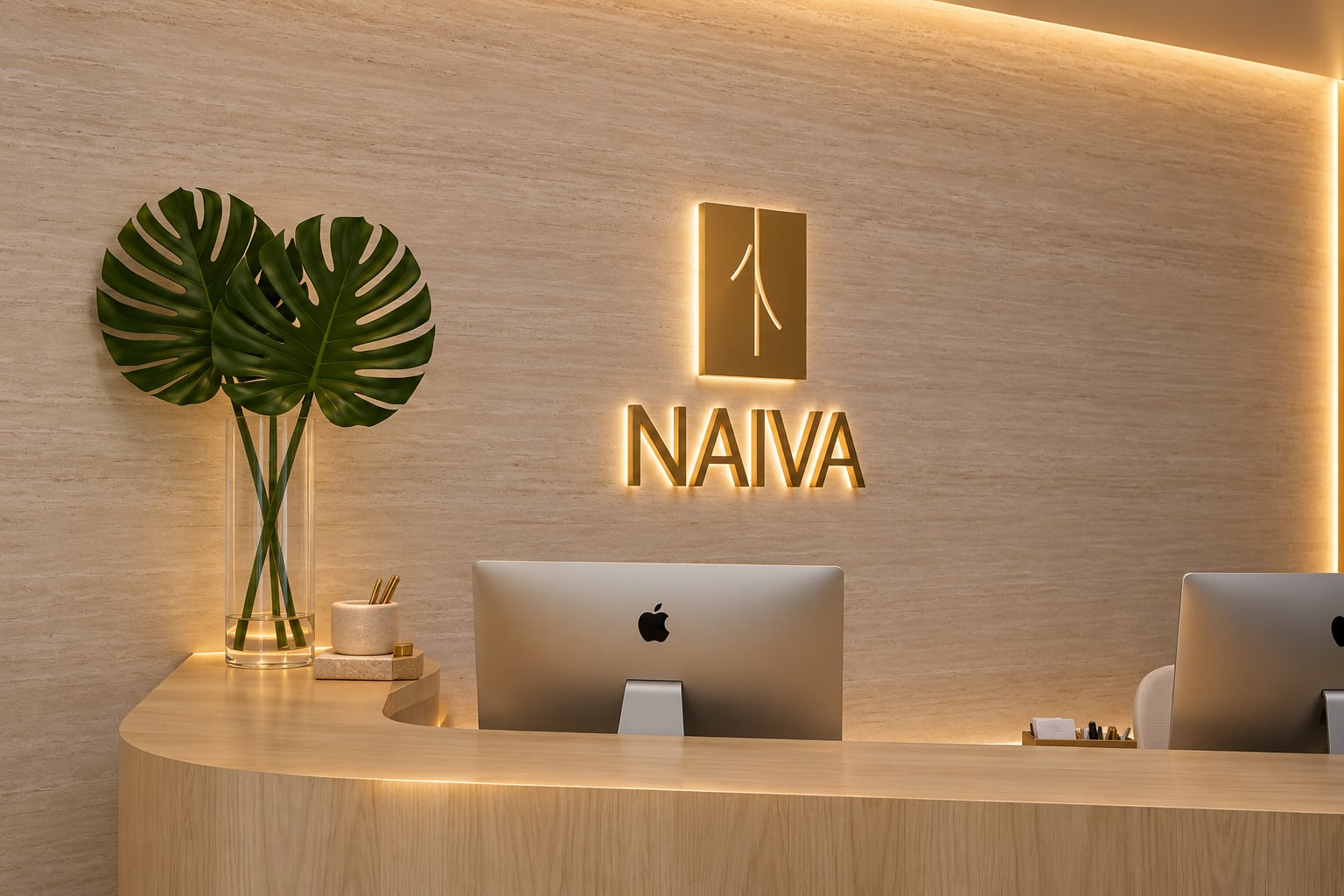 A treatment room at Naiva with a navy accent wall, white cabinetry and a treatment chair